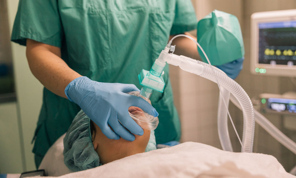 Patient relaxed in dental chair during sedation dentistry procedure